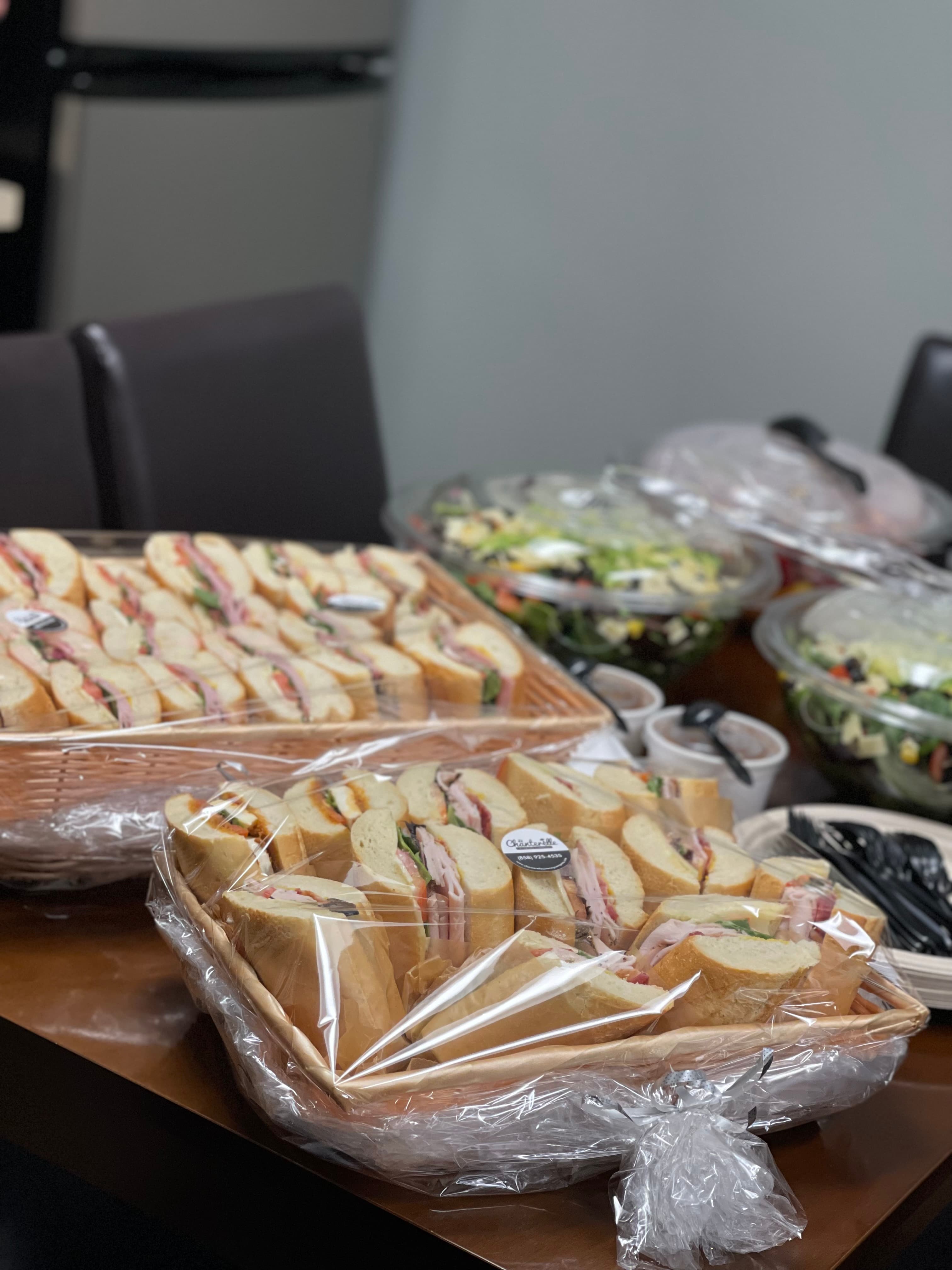 A recurring office lunch delivery laid out and ready